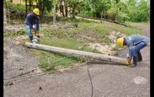 A Jamaica Public Service team at work.