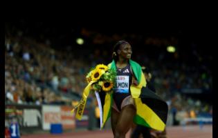 Jamaica’s Shiann Salmon celebrates after winning the 400m hurdles in a personal best 52.97 seconds at the Zurich Diamond League in Switzerland yesterday. 