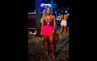 Allison Mais, COO of VM Investments, stuns in hot-pink shorts and a leather top combo.