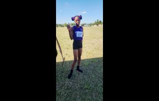 Foga Road High School’s Shameika McLean after her victory in the Class Two girls 300 metres at the Audrey E/Kevon Robinson Invitational track meet at Foga Road High School in Clarendon on Saturday.