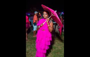 Catching our attention in pink tulle is Chavine Johns, who copped her ‘fit from local boutique Racks Off by Shampoo.