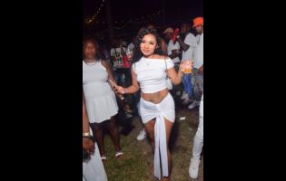 Roshelle sparkles in white at Tea Cup, held recently in Rhymesbury, Clarendon.

