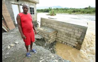 A frustrated Venrick Graham says that recent repair work he did on his home has been compromised following another heavy downpour and subsequent flooding.
