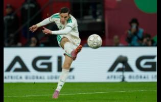 Algeria’s Adil Boulbina scores his side’s extra-time winner during the Africa Cup of Nations round-of-16  match between Algeria and DR Congo in Rabat, Morocco, yesterday.