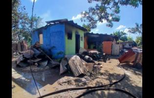 Homes in Dunbeholden Portmore, St Catherine that were damaged by a fire on January 20, 2026.