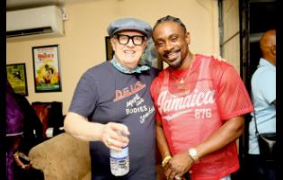 Legendary British selector David Rodigan (left) lymes with reggae crooner Christopher Martin at Dubwise: Many Rivers to Cross, held last Friday in aid of Breda Foundation in St Elizabeth.