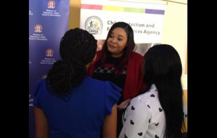 Laurette Adams-Thomas (centre), CEO of the Child Protections and Family Services Agency (CPFSA), encourages wards of the State to continue to excel in their education during the agency’s 2025 Educational Achievement Awards Ceremony at the Terra Nova Hotel in St Andrew on Thursday.