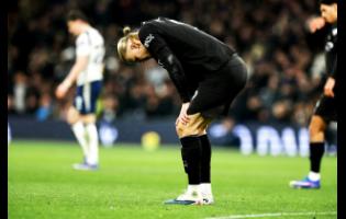 Manchester City’s Erling Haaland reacts during the English Premier League soccer match against Tottenham Hotspur in London on Sunday.