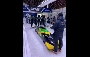 Members of the Jamaica four-man bobsled team ahead of action at the recent North American Cup.