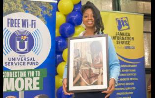 Credit: Contributed Winner of the photography category in the 2025 Jamaica Information Service (JIS) Heritage Competition, Shante Sinclair, displays her winning entry.