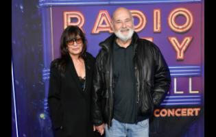 File photo of Rob Reiner (right) and wife Michele Singer Reiner.