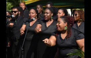 Members of Nexus Performing Arts Company deliver a rendition in honour of National Hero Sir Alexander Bustamante to commemorate the 142nd anniversary of his birth at National Heroes Park in Kingston on Tuesday.