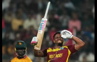 West Indies’ Shimron Hetmyer celebrates his half-century during the T20 World Cup cricket match between Zimbabwe and West Indies in Mumbai, India, on Monday.