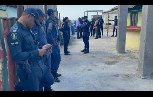 Credit: Contributed Police personnel on the scene of the incident.