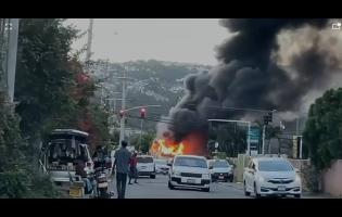JUTC bus burst into flames near the busy intersection by the AC Marriott hotel