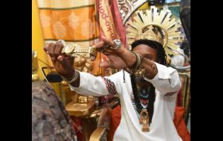 LA Lewis flashes what he says is a million-dollar timepiece.