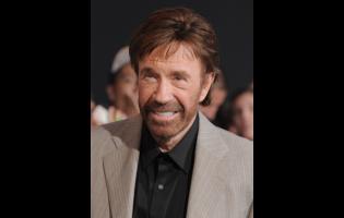 FILE - Chuck Norris attends the premiere for "The Expendables 2" on Aug. 15, 2012 in Los Angeles. (Photo by Jordan Strauss/Invision/AP, File)