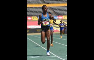Hydel’s Nastassia Fletcher wins her race in the Girls’ Class One 400m at Champs 2026.