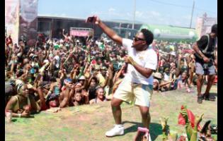 Soca artiste Voice interacts with patrons during his performance at Xodus Wet yesterday at Port Spectrum, downtown Kingston.