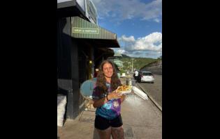Credit: Contributed Zoe Reeve gets some grub at Melrose Hill Yam Park during her latest trip to Jamaica.