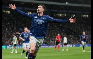 Arsenal’s Kai Havertz celebrates after scoring his side’s winning goal during the Champions League quarterfinals, first-leg match between Sporting CP and Arsenal, in Lisbon yesterday.
