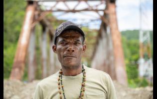 Cephas Johnson revisits the bridge where he was pulled from the brink of death by rescuers.
