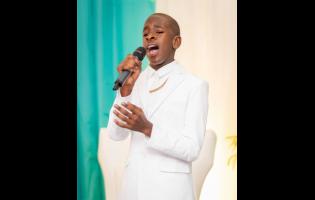 Enoch Thomas performs at his album launch.