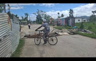 A taxi strike and roadblock in Hertford, Westmoreland on Monday disrupted movement, leaving commuters stranded