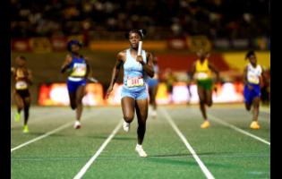 Edwin Allen High School’s Renecia Edwards anchors her team to win the Class One girls’ 4x100m relay on day five of the ISSA GraceKennedy Boys’ and Girl’s Athletics Championships on March 28 at the National Stadium. 
