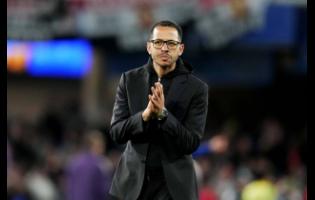 Chelsea’s head coach Liam Rosenior leaves the field after the English Premier League soccer match against Manchester United in London, on Saturday.
