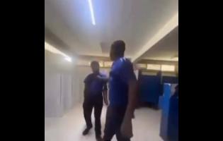 A screenshot from a video showing a Jamaica College student being assaulted by a schoolmate. 

