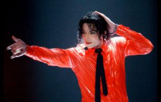 FILE – Michael Jackson performs during the taping of the American Bandstand’s 50th anniversary show in Pasadena, California in 2002. 