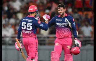 Rajasthan Royals’ Donovan Ferreira (right) and Shubham Dubey celebrate after they won the Indian Premier League match against Punjab Kings in New Chandigarh, India, yesterday.