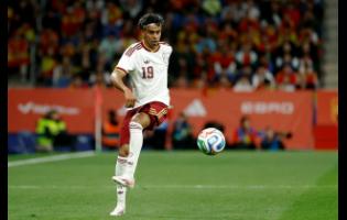 Spain’s Lamine Yamal controls the ball during the international friendly soccer match against Egypt in Barcelona, Spain, on March 31.