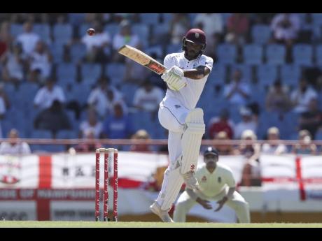 West Indies opener John Campbell of Jamaica plays a shot during day two of the third cricket Test match at the Daren Sammy Cricket Ground in Gros Islet, St Lucia, on Sunday.