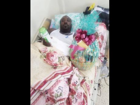 Police Constable Kemar Brown recovering in hospital. 