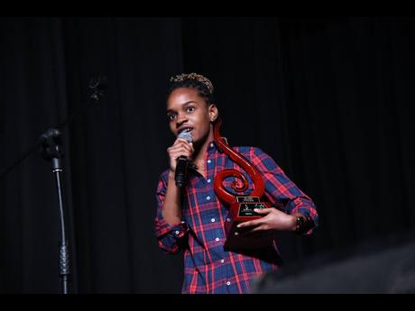 
Koffee responds after taking the for song of the year award for ‘Toast’.