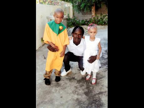 Credit: Contributed Contributed
The late Lloyd Thomas Jr with two of his children.