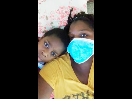 Credit: Contributed
Renae and her son at the Cornwall Regional Hospital in St James.