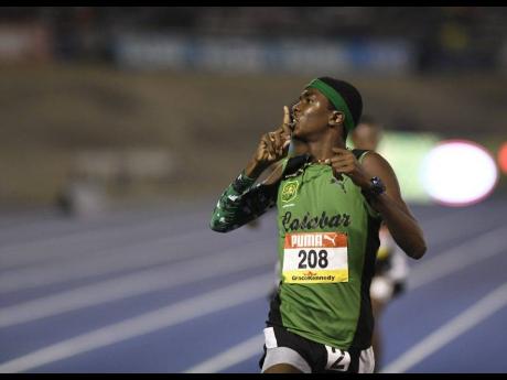 Credit: Gladstone Taylor Kevroy Venson of Calabar looks to the KC fans in the stands as he silences all doubts by winning the Class Two boys 1500m at the 2018 ISSA/GraceKennedy Boys and Girls’ Athletics Championships.