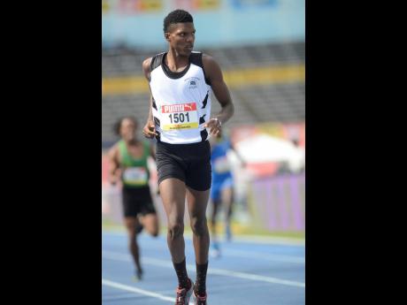 Credit: Shorn Hector Jeremy Bembridge of Tarrant High wins heat three of the Class Two 400m on day two of the ISSA/GraceKennedy Boys and Girls’ Championships at the National Stadium yesterday.