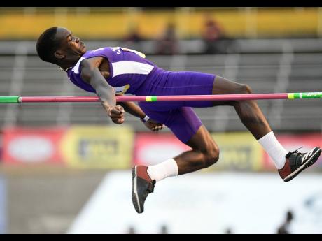 Credit: Gladstone Taylor Anthony Willis of Kingston College wins the Class Three boys high jump with a leap of 1.81 metres.