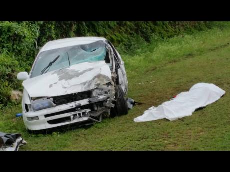 The Toyota Corolla in which taxi driver Leonard Clarke died in a motor vehicle accident last Thursday in Trelawny.
