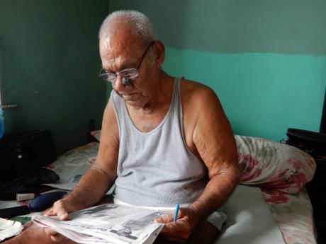 Credit: Sashana Small Phillips Coombs takes a read.