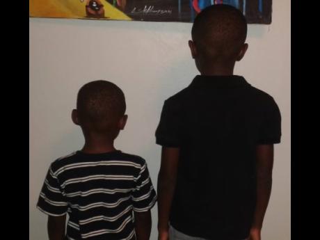 JahDore’s four-year-old and eight-year-old Rastafarian stepsons who he alleges were given a haircut after policemen removed them from their home on April 30.