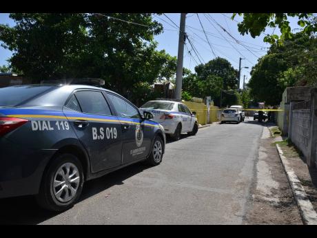 Credit: Kenyon Hemans Police cordon off a section of this road in Maxfield, where a man was shot yesterday afternoon.