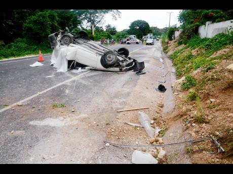 This Nissan AD Wagon motor car crashed along a section of the Ferris main road in Westmoreland on Thursday afternoon, claiming the life of 21-year-old Andre Daley.