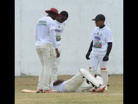 Credit: Ian Allen A batsman from Heartease suffered a nasty blow from a fast bowler from Johnson Mountain in the SDC Community Cricket competition yesterday.