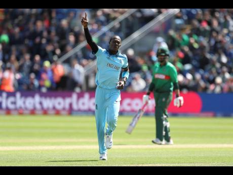 England’s Jofra Archer celebrates bowling out Bangladesh’s Soumya Sarkar during the ICC Cricket World Cup group-stage match at the Cardiff Wales Stadium in Cardiff last Saturday.