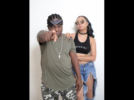 Bad Gyal Marie (right) poses with her mentor, Likkle Shabba, who is also part of Notorious International. 